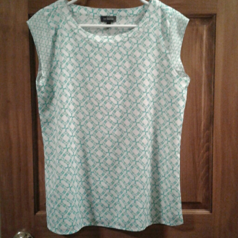 The limited green and white top