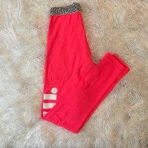 Neon pink Nike Pro athletic leggings