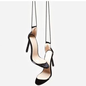 Public desire heels clear black