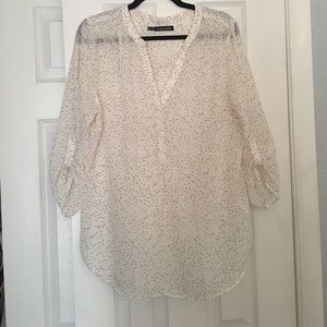 White polka dotted blouse