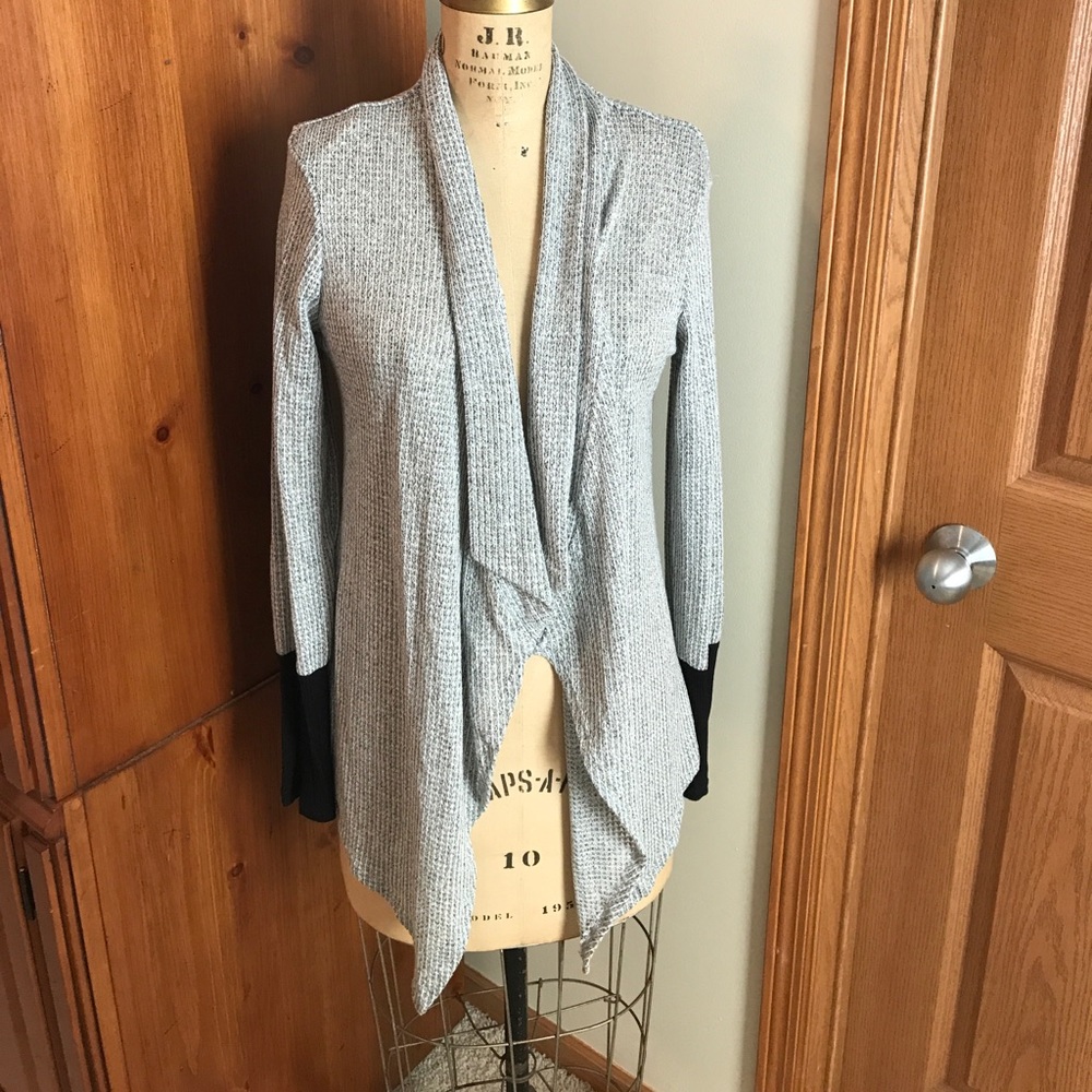Maurice's grey cardigan