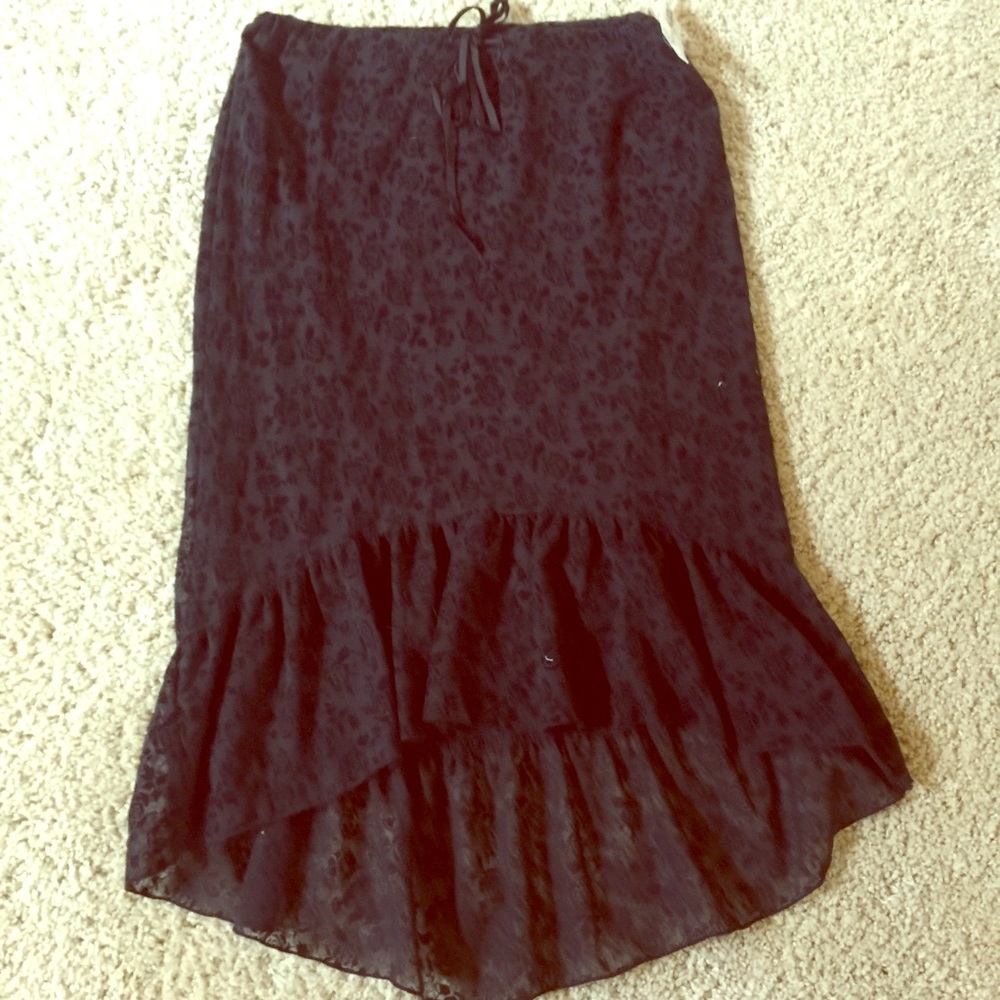 Black skirt, shorter in front longer back