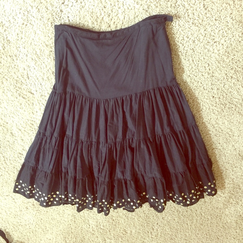 Black skirt, below the knee
