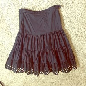 Black skirt, below the knee