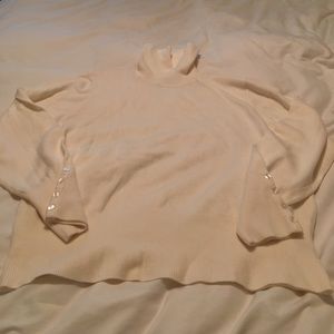 Cream turtleneck sweater