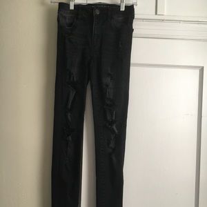 Nearly new black ripped skinny jeans