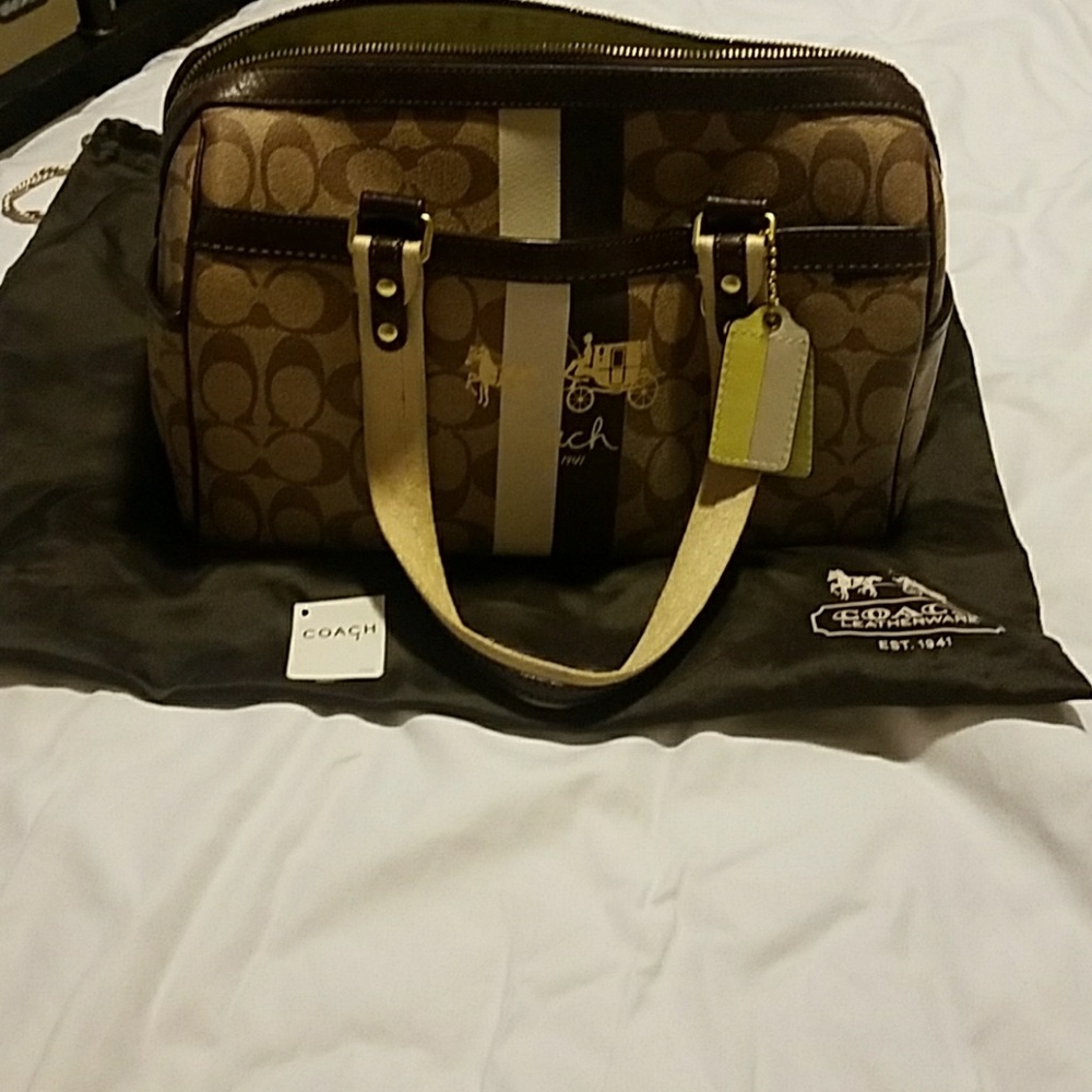 Coach satchel brown/ lime green on inside.