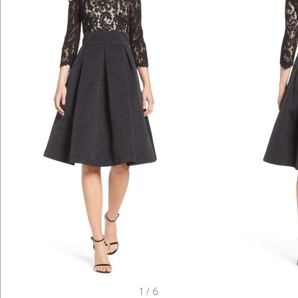 Black pleated midi flare skirt