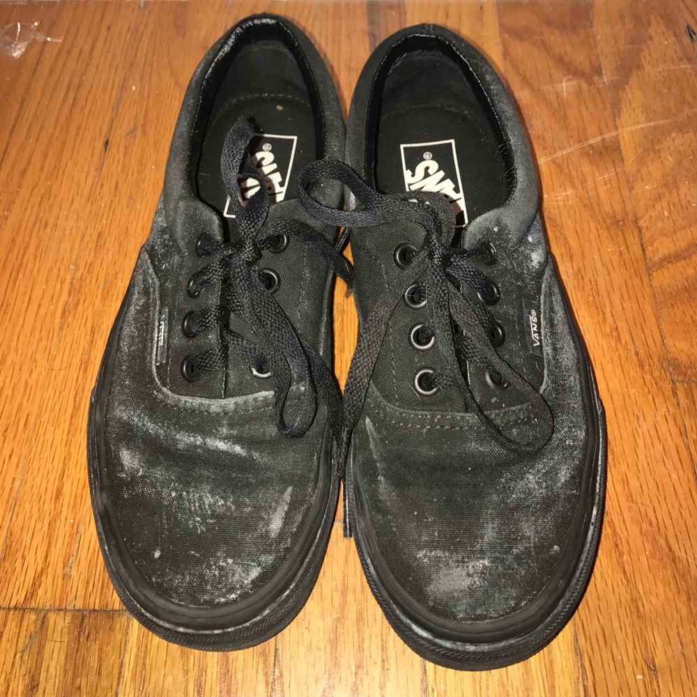 Black Vans.