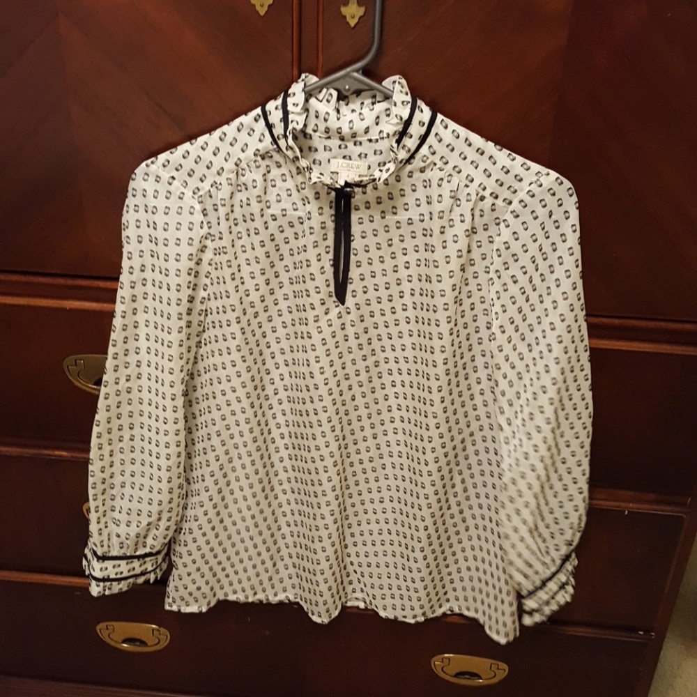 J. Crew white top with black designs.