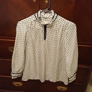 J. Crew white top with black designs.