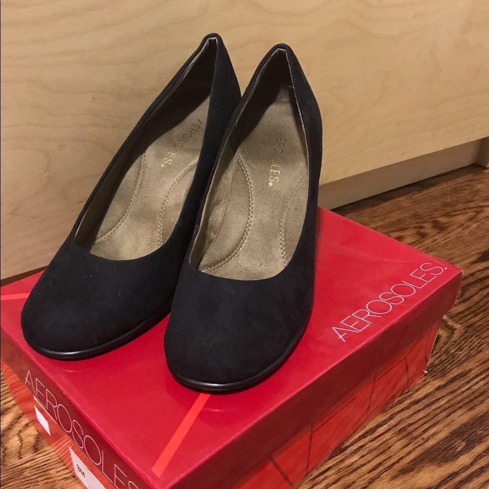 Black with gold studs on the wedge