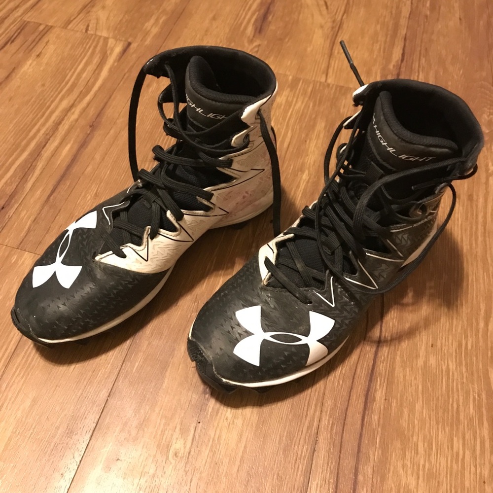 Boys Under Armour football shoes.