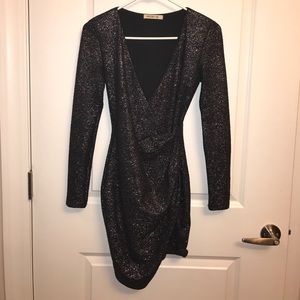 Black long sleeve dress with a glitter look