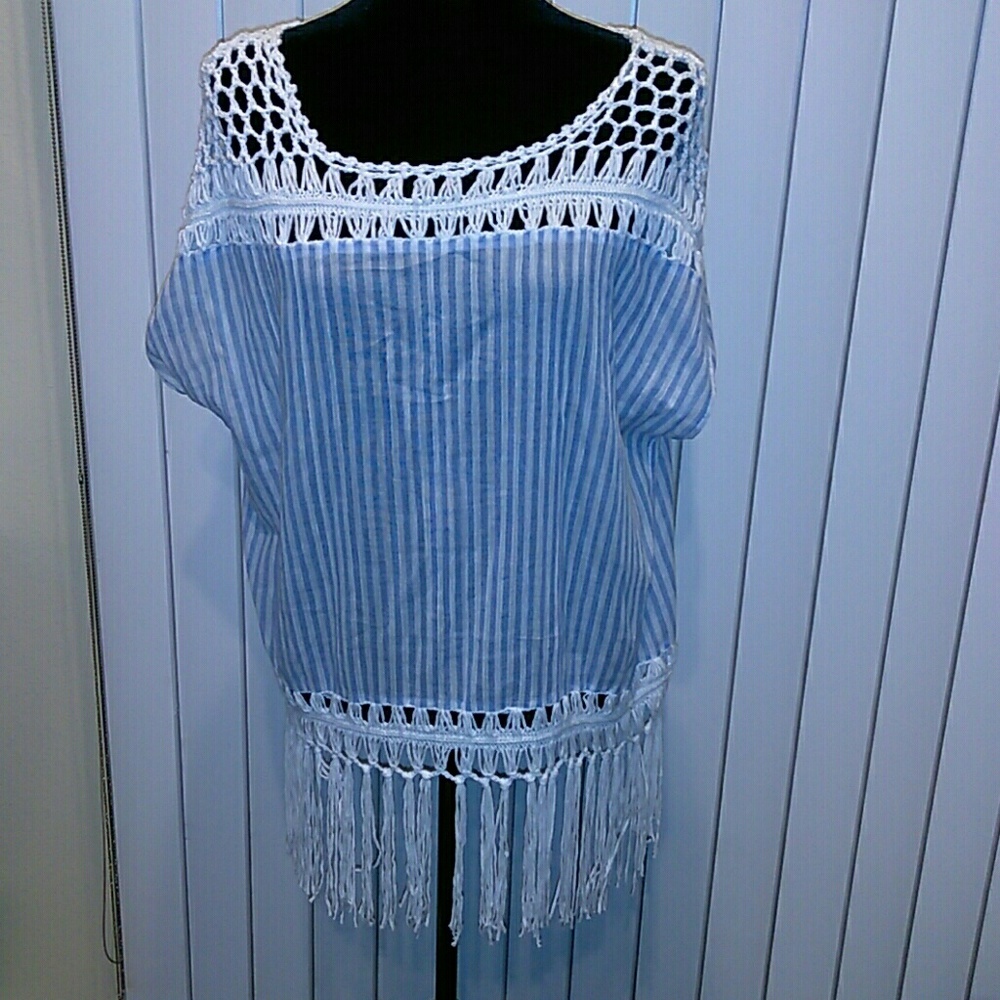 Light blue and white blouse made with tassel's