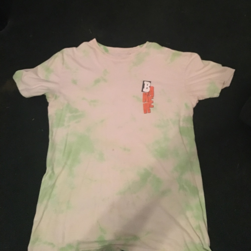 T shirt worn has small stain