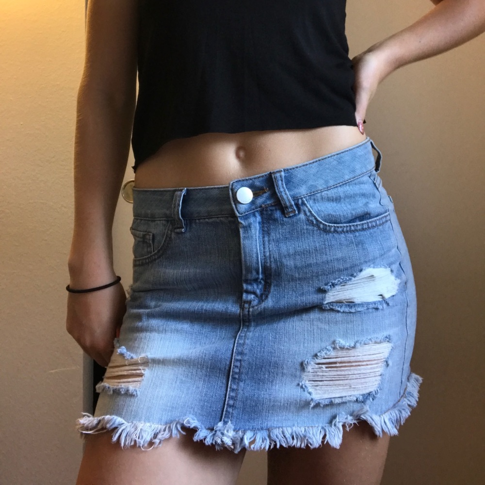 Distressed jean mini skirt