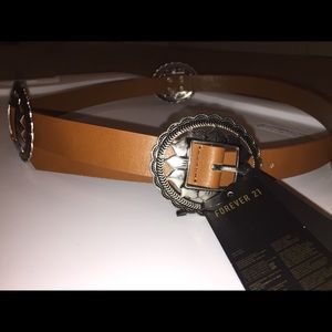 Light brown belt with silver decor