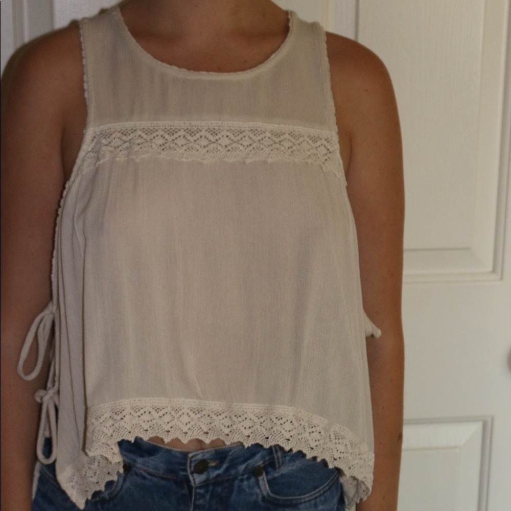 Off white tank top with tied up sides