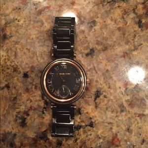 Michael Kors rose gold and black watch