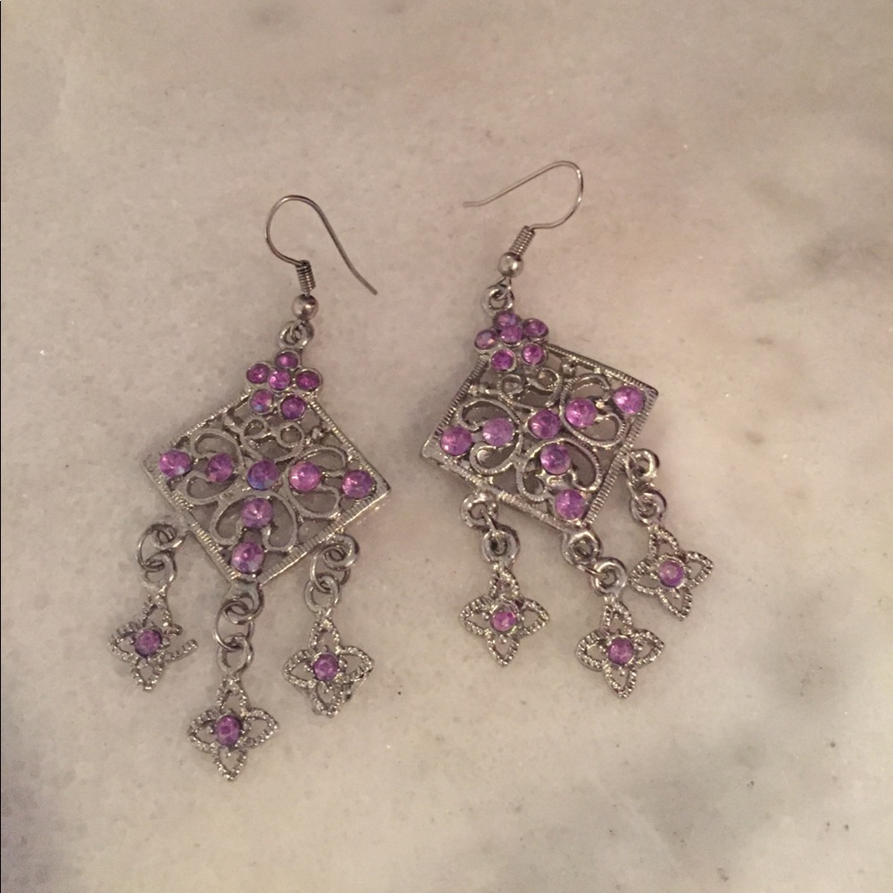 Silver earrings with amethyst stones.