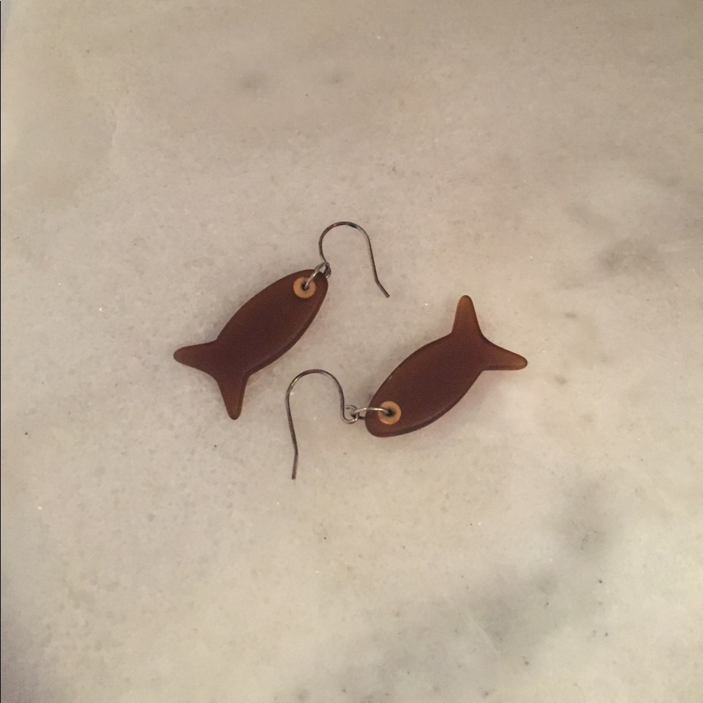 Brown polished glass fish earrings.
