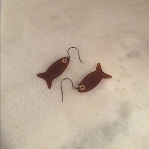 Brown polished glass fish earrings.