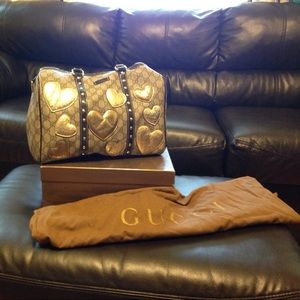 Authentic Gucci bag with heart embroidery
