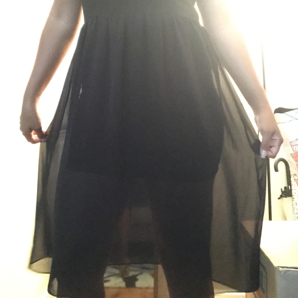Black strap mid length dress with sheer overlay