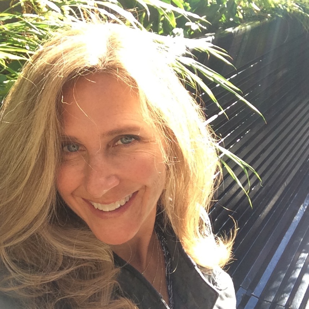 Fashionable black choker neck blouse.