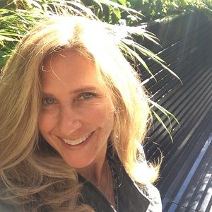 Fashionable black choker neck blouse.