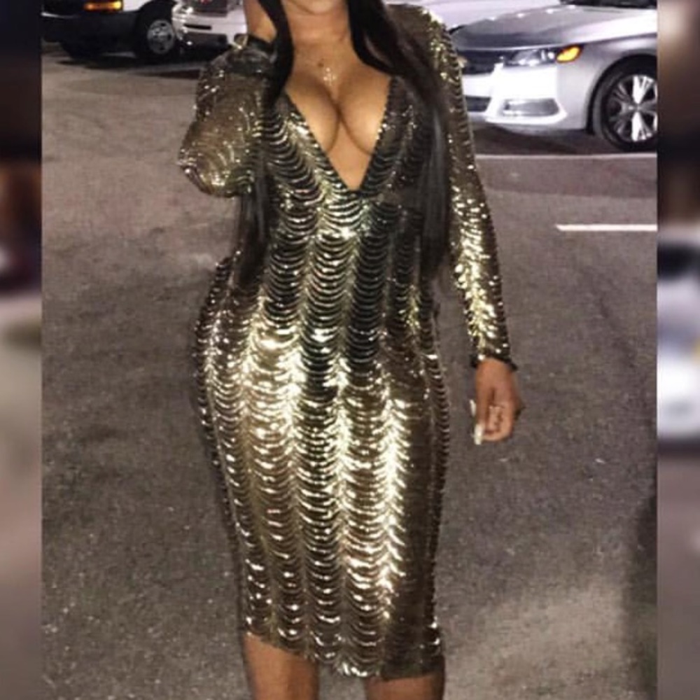 Gold and black sequin dress