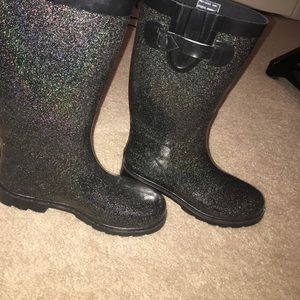 black rain boots with multicolor sparkles