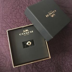 NWT- Coach gold signature ring.