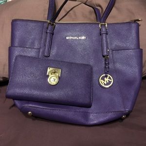 Purple Michael Kors leather tote bag with wallet