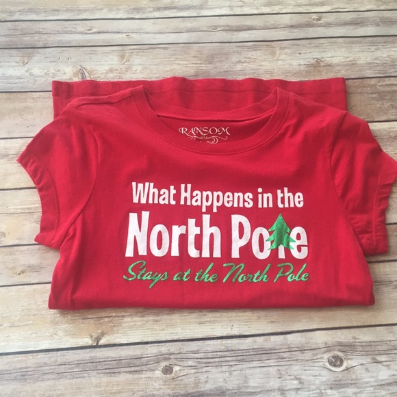 What Happens At The North Pole Christmas Tee Shirt - Picture 1 of 8