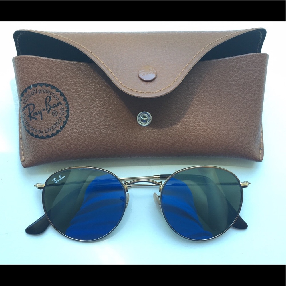 Round frame RayBan sunglasses with blue tint