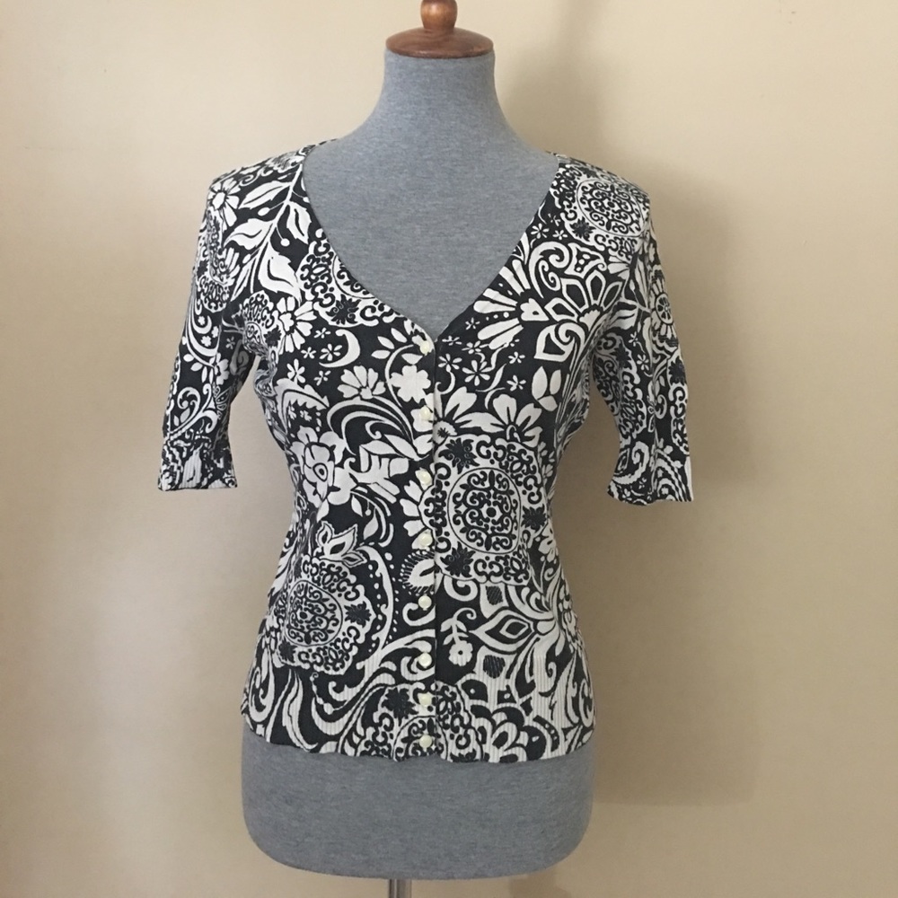Three quarter length cardigan.