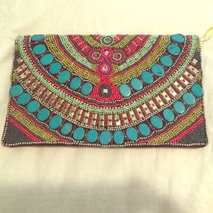 BCBGeneration multicolored clutch