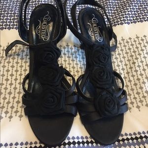 Black heels with flower accent