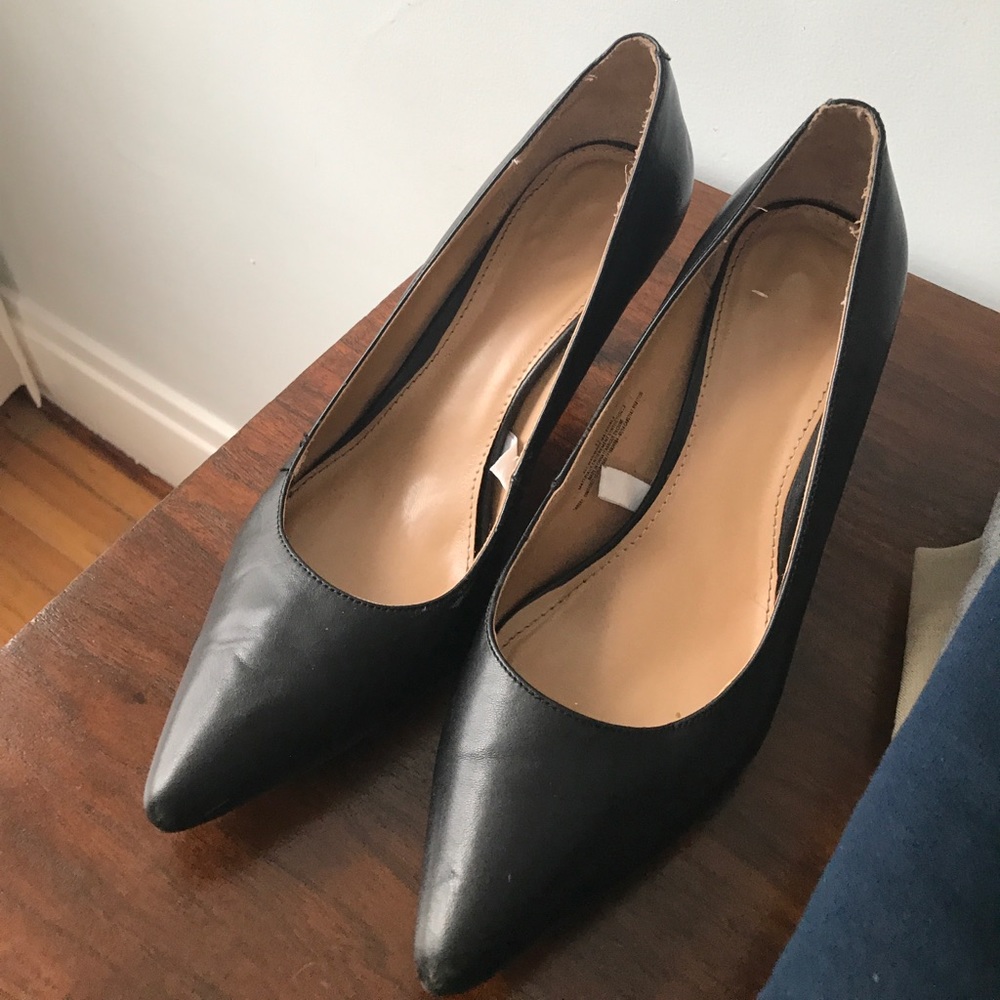 Pointy toed black high heels