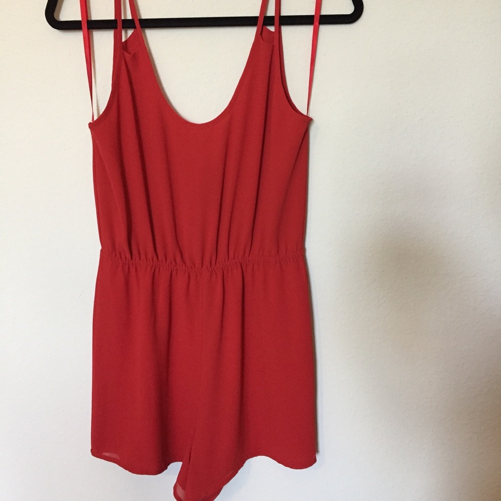 Naked Zebra romper in red
