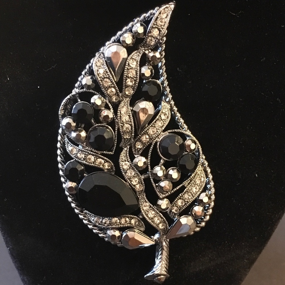 Large silver, black, and marcasite brooch