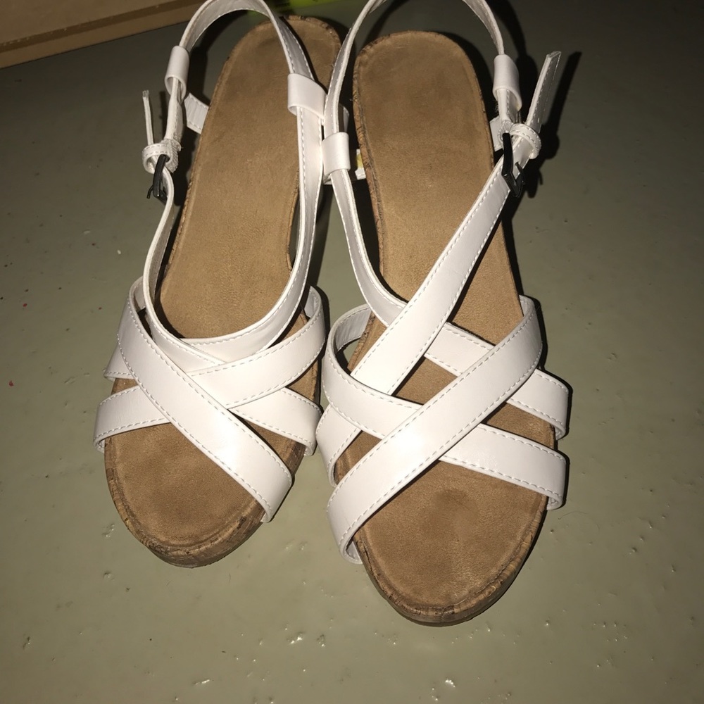 White wedge sandals.