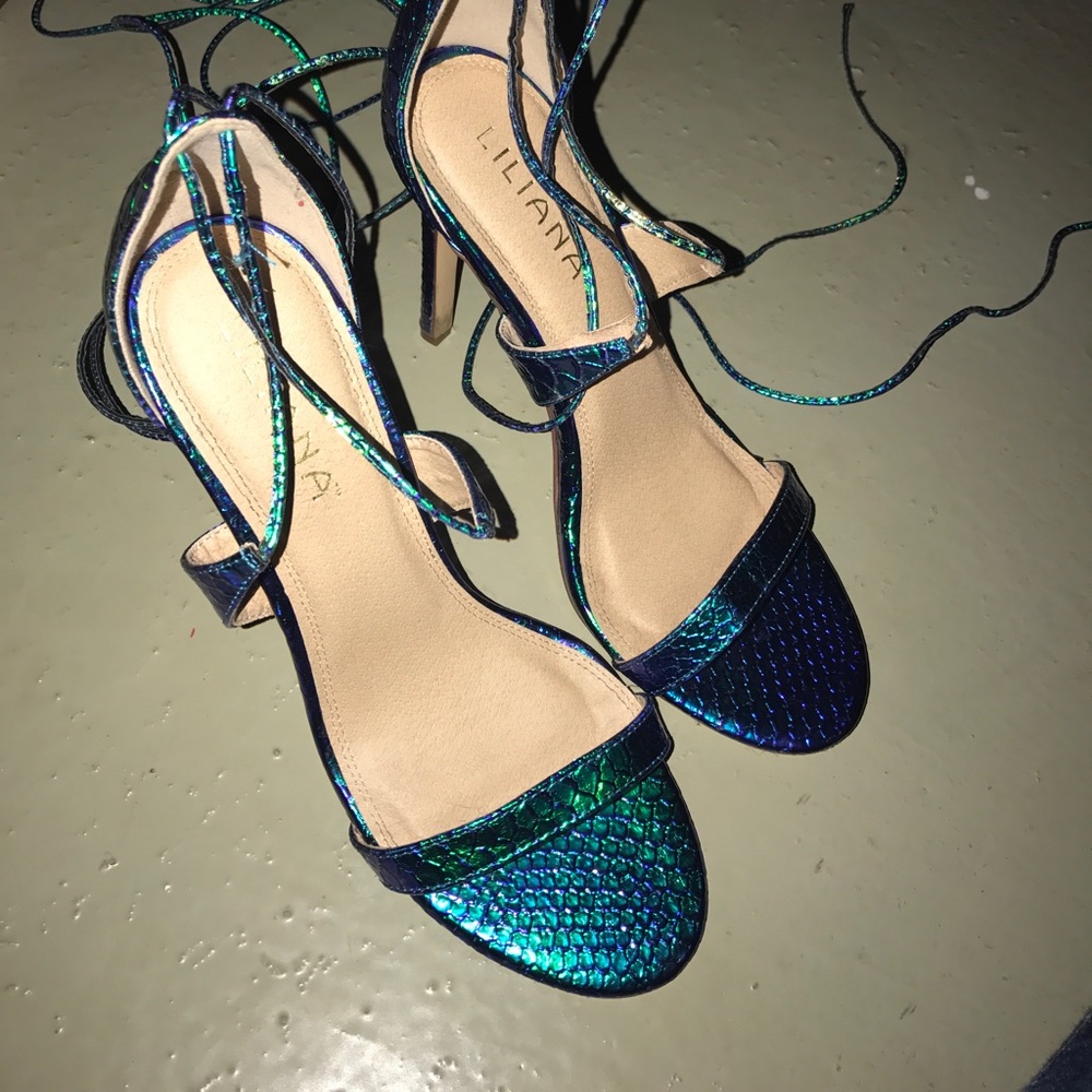 Lace up iridescent heels.