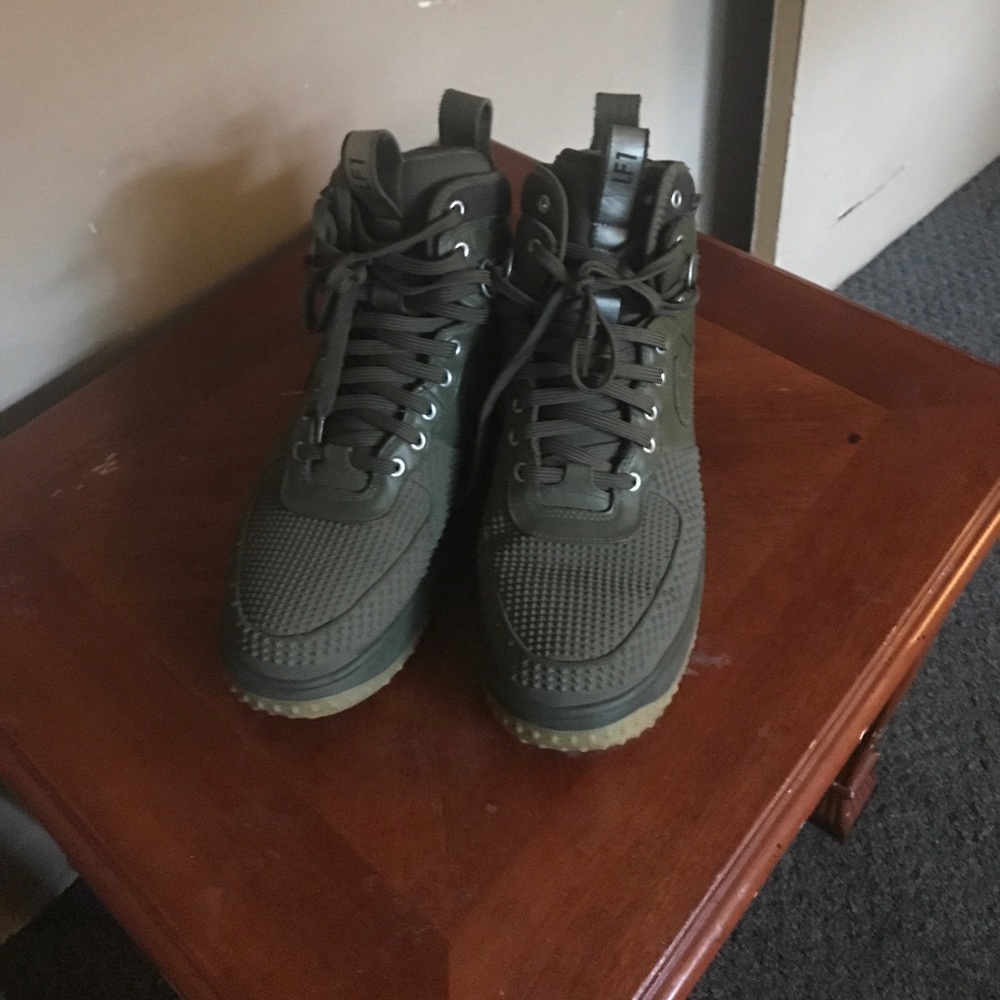 Olive green Nike Duck boots.