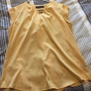 Yellow blouse with buckle detail