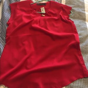 Red blouse with buckle detail
