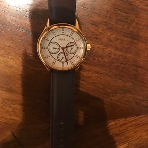Rose gold face fossil watch