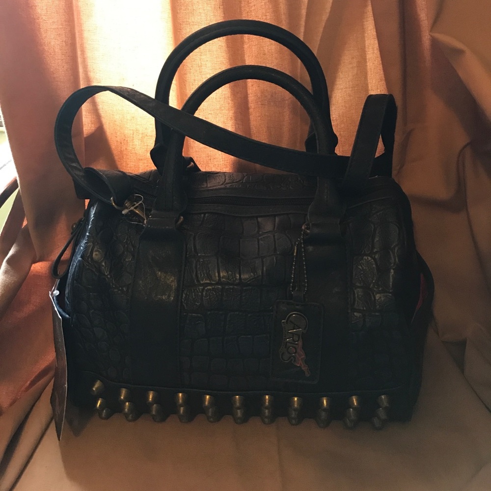 Carlos by Carlos Santana convertible bag